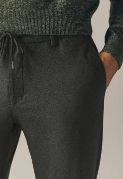 Gemêleerde chino in stretchstof