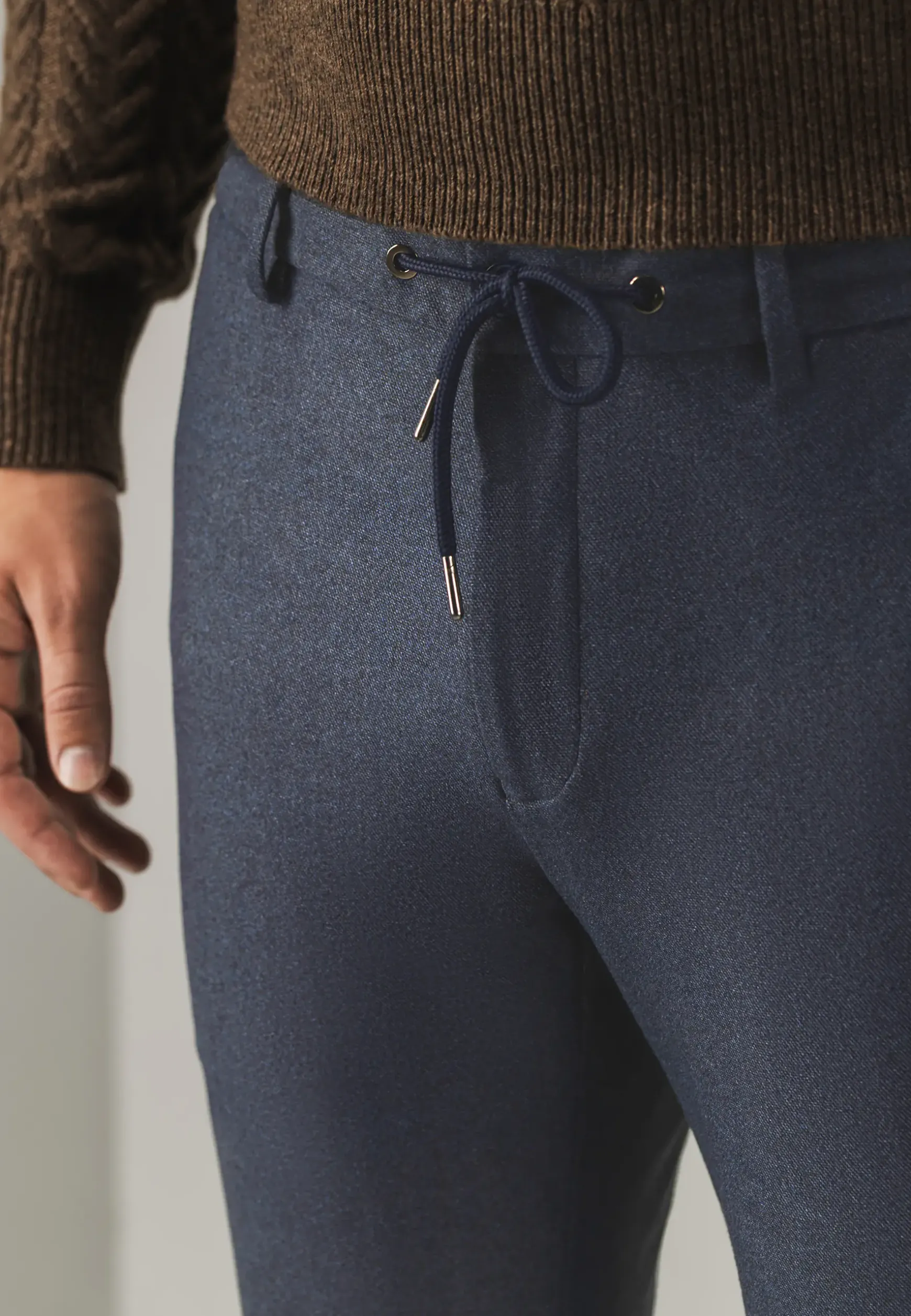 Gemêleerde chino in stretchstof