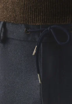 Gemêleerde chino in stretchstof