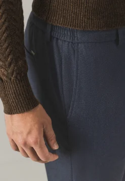 Gemêleerde chino in stretchstof