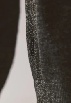 Gemêleerde trui met ribdetails