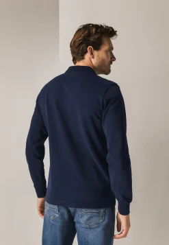 Polo met structuurgebreide kraag